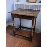 A late 17th/early 18thC oak side table, the rectangular plank top with a moulded edge, frieze drawer