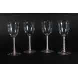 A pair of 18thC style wine goblets, with campana shaped bowls, on double opaque twisted stems, and