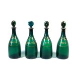 Withdrawn pre-sale by vendor A set of four late 18thC green glass decanters, of plain mallet