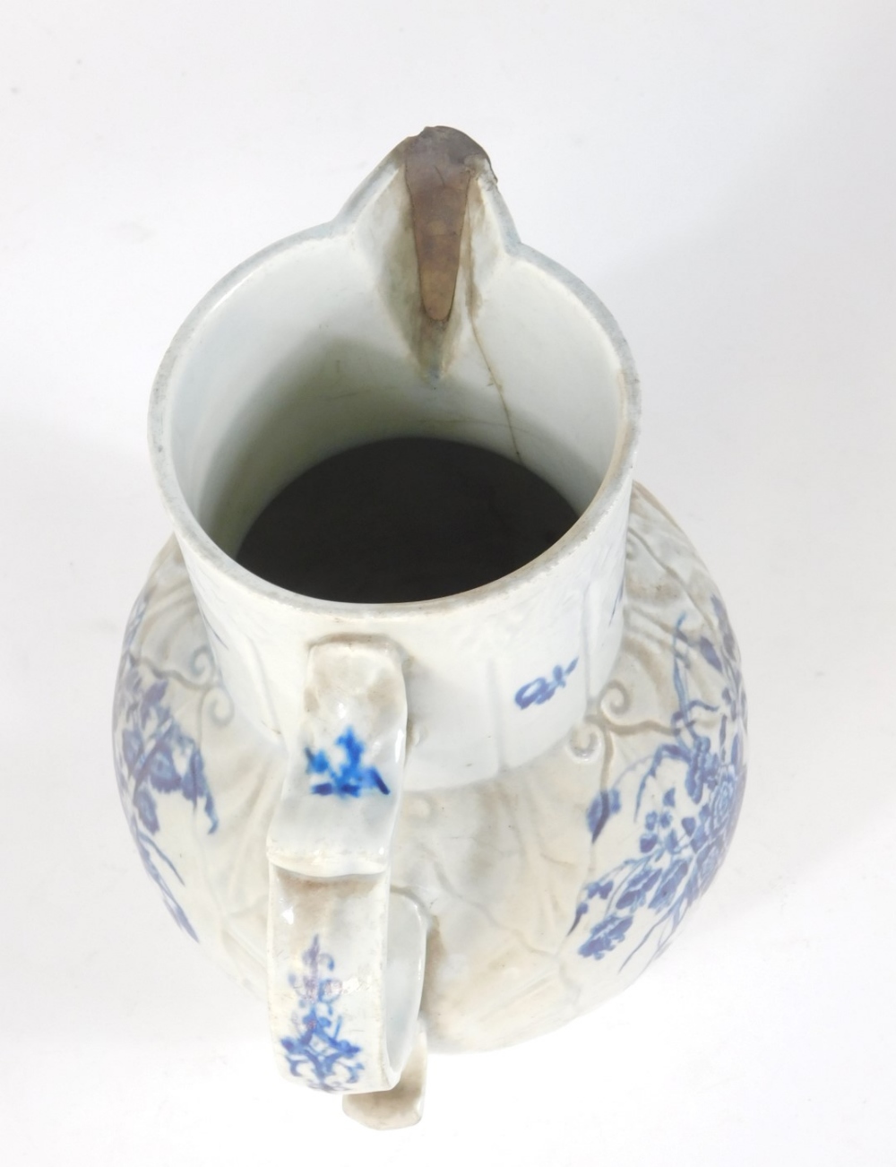 A Worcester blue and white cabbage leaf mask jug, c1780, decorated with floral sprays, 'C' marked, - Image 3 of 4