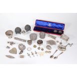 A collection of silver bijouterie and curios, including a pill box, Victorian vinaigrette, miniature