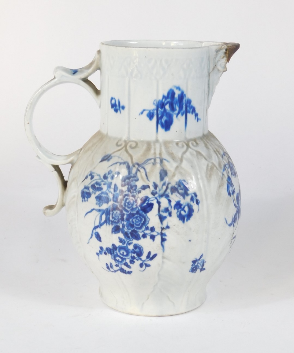 A Worcester blue and white cabbage leaf mask jug, c1780, decorated with floral sprays, 'C' marked, - Image 2 of 4