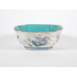 A 19thC Chinese porcelain lobed bowl, with turquoise interior, and exterior band of fish decorated