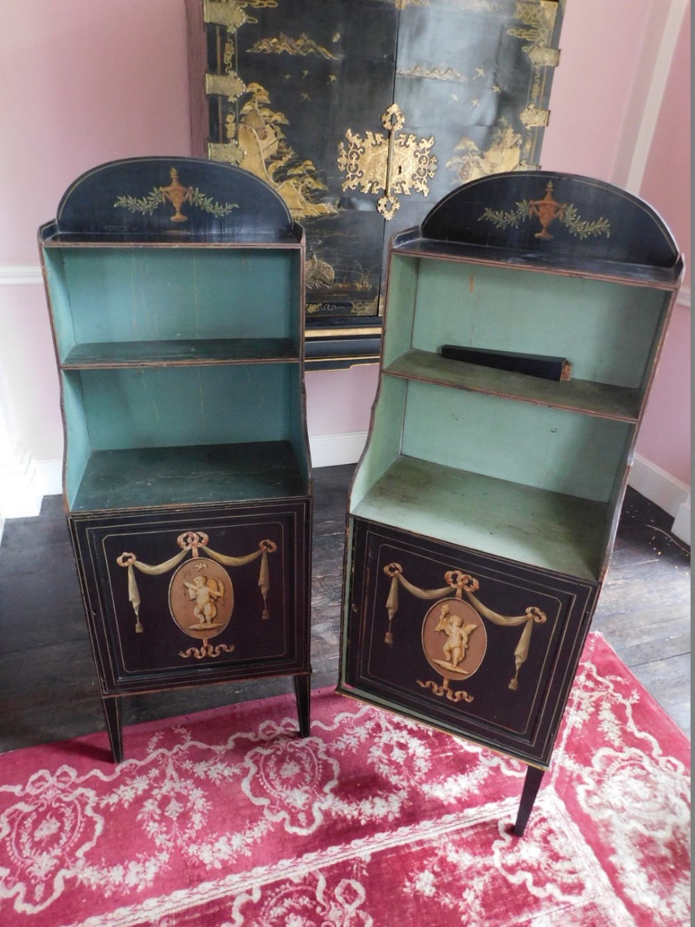 A pair of George III painted waterfall side cabinets, on a black ground, each with a raised top - Image 2 of 4