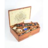 A George III mahogany artist's paint box for R Ackermann of Regent Street, the fitted interior