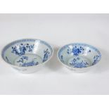 Two graduated Chinese blue and white porcelain bowls, decorated with peonies, 17cm and 14cm