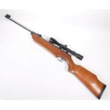 A Cometa-300, .22 air rifle, with break barrel action and Tasco pronghorn telescopic sights.