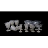 Four Regency cut glass goblets, with hobnail cut tapered sides and hexagonal knop stems, a small