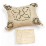 A George III silk pin cushion from the Royal household, of pillow shaped design with period steel