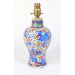 A Chinese baluster vase with clobbered decoration, converted to a table lamp, mock Chinese red