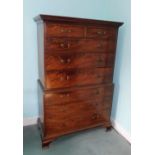 A George III mahogany chest on chest, the top with a dentil cornice and two short and three long
