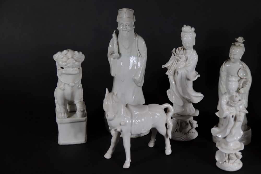 A group of 19thC and later Chinese Blanc De Chine figures, of temple dogs, horses and court figures, - Image 2 of 3
