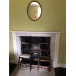 A gilt gesso oval wall mirror, with a moulded frame, 54cm x 44cm, a Victorian balloon back bedroom