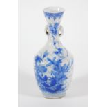 A 19thC Japanese Seto blue and white porcelain bottle vase, with tapering neck with handles and