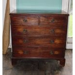 An early 19thC chest of drawers, top with a moulded edge above two short and three long drawers with