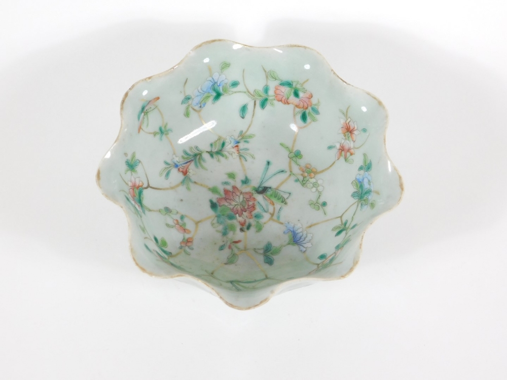 A 19thC celadon glazed Chinese porcelain bowl enamelled with peony branches, with wavy edge and - Image 2 of 4