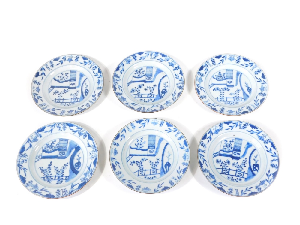 A set of six 18thC Chinese blue and white plates, decorated with oriental landscapes, 23cm