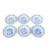 A set of six 18thC Chinese blue and white plates, decorated with oriental landscapes, 23cm