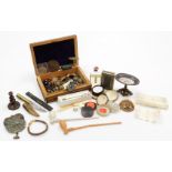 A collection of small curios and bijouterie, including wax seals, a small bottle of Dead Sea