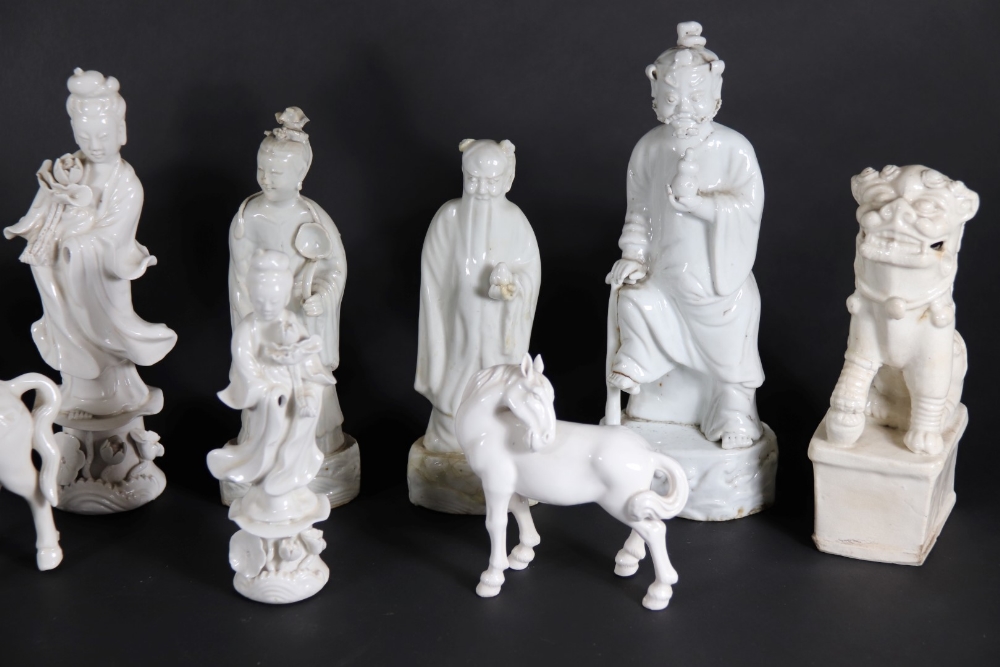 A group of 19thC and later Chinese Blanc De Chine figures, of temple dogs, horses and court figures, - Image 3 of 3