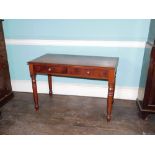 An early Victorian mahogany side table, the top with a moulded edge above two frieze drawers each