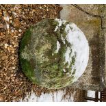 A hand hewn stone petrosphere, 54cm diameter.