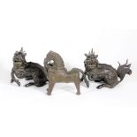 A pair of 19thC Chinese bronze figures of kylins, 15cm long and a cast bronze horse 13cm high. (AF-