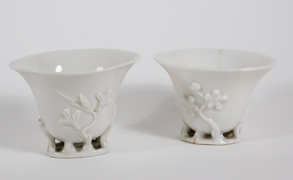 A pair of 18th/19thC Chinese Blanc De Chine libation cups, moulded with open work naturalistic