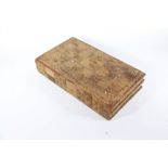 A 19thC back gammon box, with leather lined interior and gilt decorati