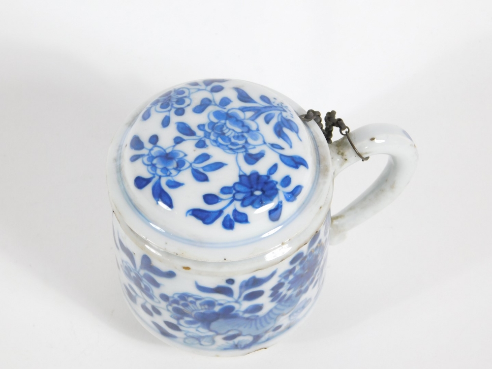 A 18thC Chinese pot and cover, of cylindrical form with blue and white floral decoration, 9cm high. - Image 2 of 4