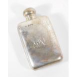 An Edwardian silver hip flask, with slightly curved back, bayonet cap and engraved monogram GKL,