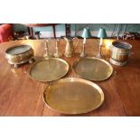 Two Persian brass trays, 48cm diameter, two pairs of brass candlesticks, copper tapered jug and