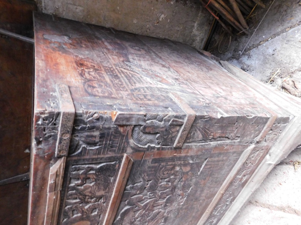 A large 17thC carved poker work walnut coffer, the lid with iron strap hinges and carved figural and - Image 4 of 4