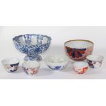 Six various 18th and 19thC Japanese porcelain bowls, and a Chinese blue and white stem cup wit
