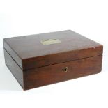A George III mahogany rectangular cutlery box, with inset brass handle to the hinged lid, with