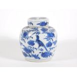 A late 19thC Chinese blue and white porcelain ginger jar and cover, handpainted with birds and
