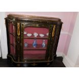 A Victorian Boulle and ebonised credenza, with a pierced gilt gallery, a concave frieze decorated