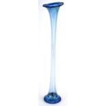 A continental art glass trumpet shaped slender vase, with mottled green and blue decoration, 56cm