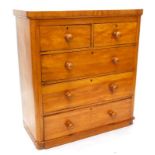 A Victorian satin walnut chest of drawers, with a plain top, above two short and three long drawers,