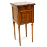 A French oak bedside cabinet, with a red varigated marble top, above a frieze drawer and a