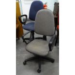 Two modern office chairs, with adjustable bases.