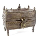 A Middle Eastern bronze rectangular casket, decorated with finials, stylised wave design, etc., on