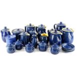 A quantity of blue glazed Denby stoneware, to include lidded jugs, jar and cover, etc. (2 trays)