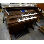 A Yamaha electric Electone AR-100 keyboard organ.