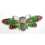 A plique-a-jour dragonfly brooch, set with opals, rubies and marcasite, in red, green and yellow
