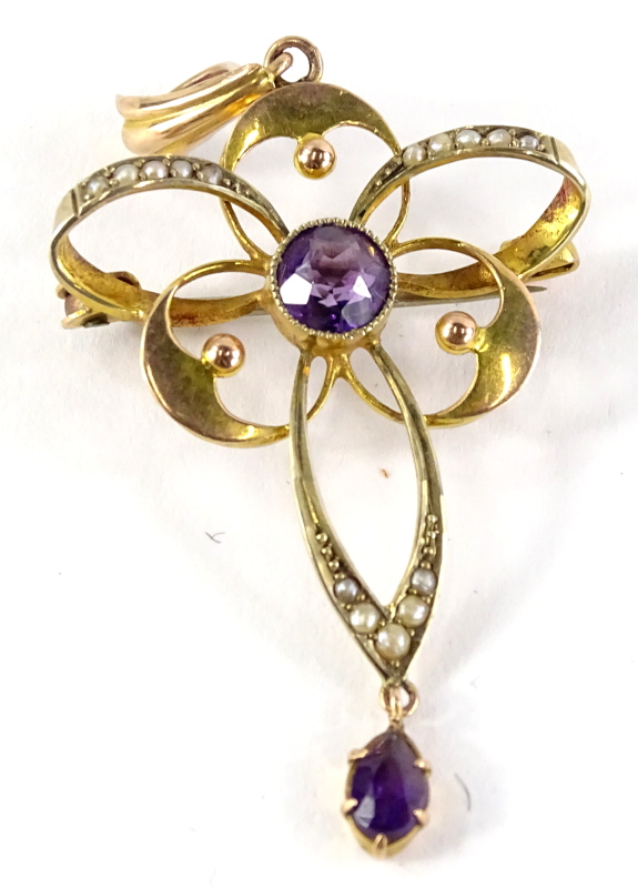 A 9ct gold amethyst pendant, with central stone and various circles and ovals, embellished with seed