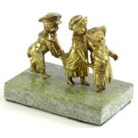 A gilt bronze figure modelled in the form of a procession of children, on a later marble base,