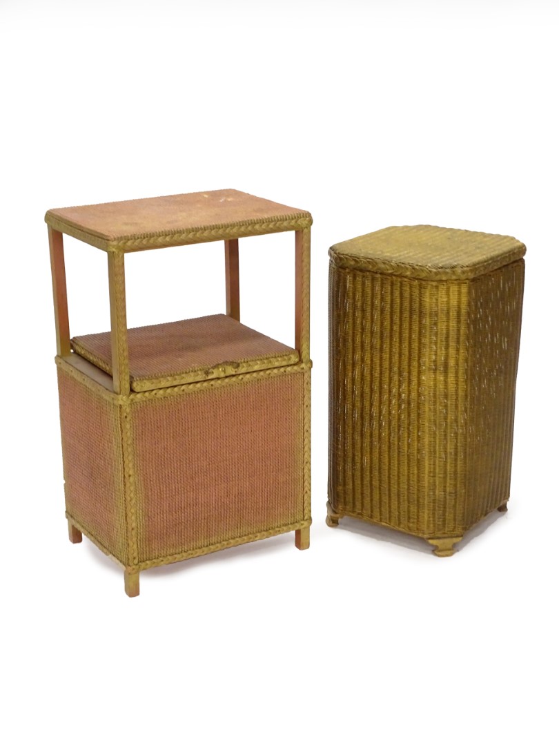 A gilt Lloyd Loom type linen basket, with canted corners and shaped feet, and a Lloyd Loom type