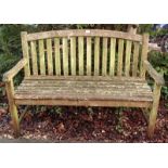 A slatted hardwood garden bench.