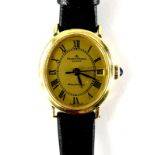 A ladies Baume and Mercier Baumatic Swiss ladies wristwatch, the 18ct gold oval case, inset with a